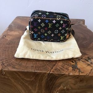 Authentic Louis Vuitton “Murakami” wristlet.